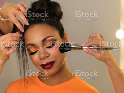 Open workshop hairdressing. Master class makeup art shows on model. Fashion professional. Practice skills obtained at vocational training centre. Vlogger  makeup tutorial channel. Concept of study. Banner or header with close up. Beauty industry. Space for text.